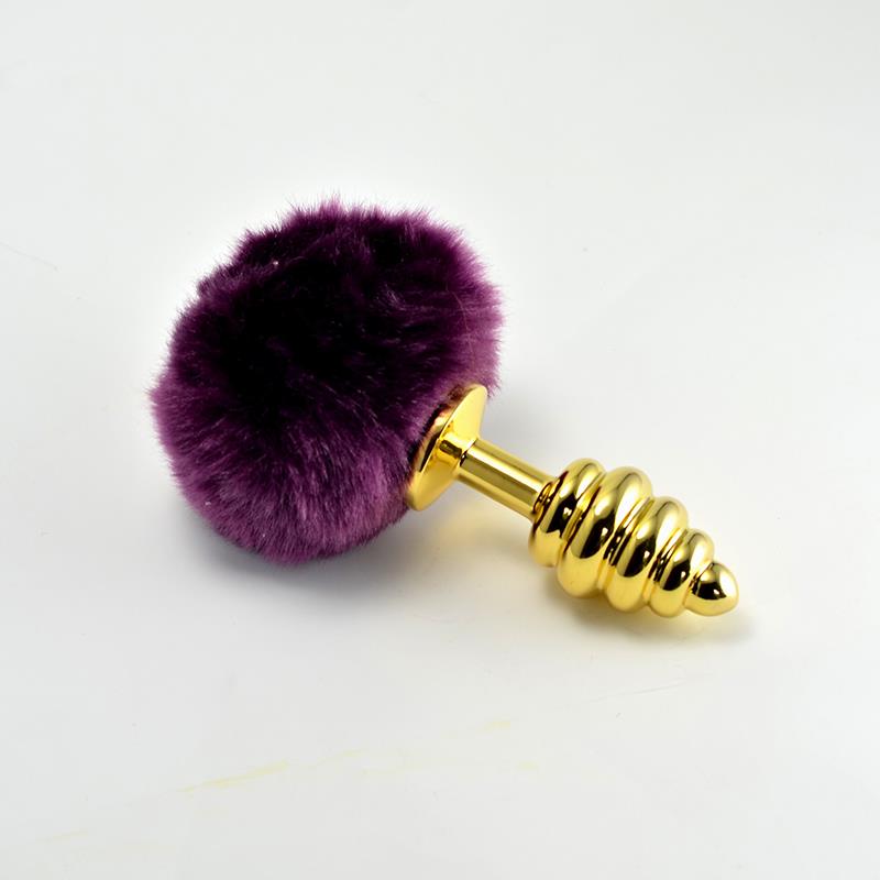 GOLD PLUG WITH PURPLE POMPON